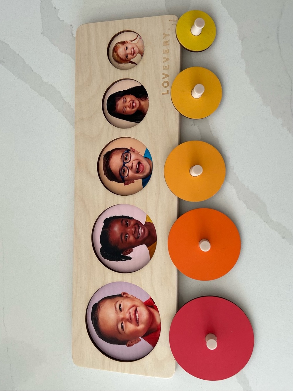 lovevery hidden faces puzzle